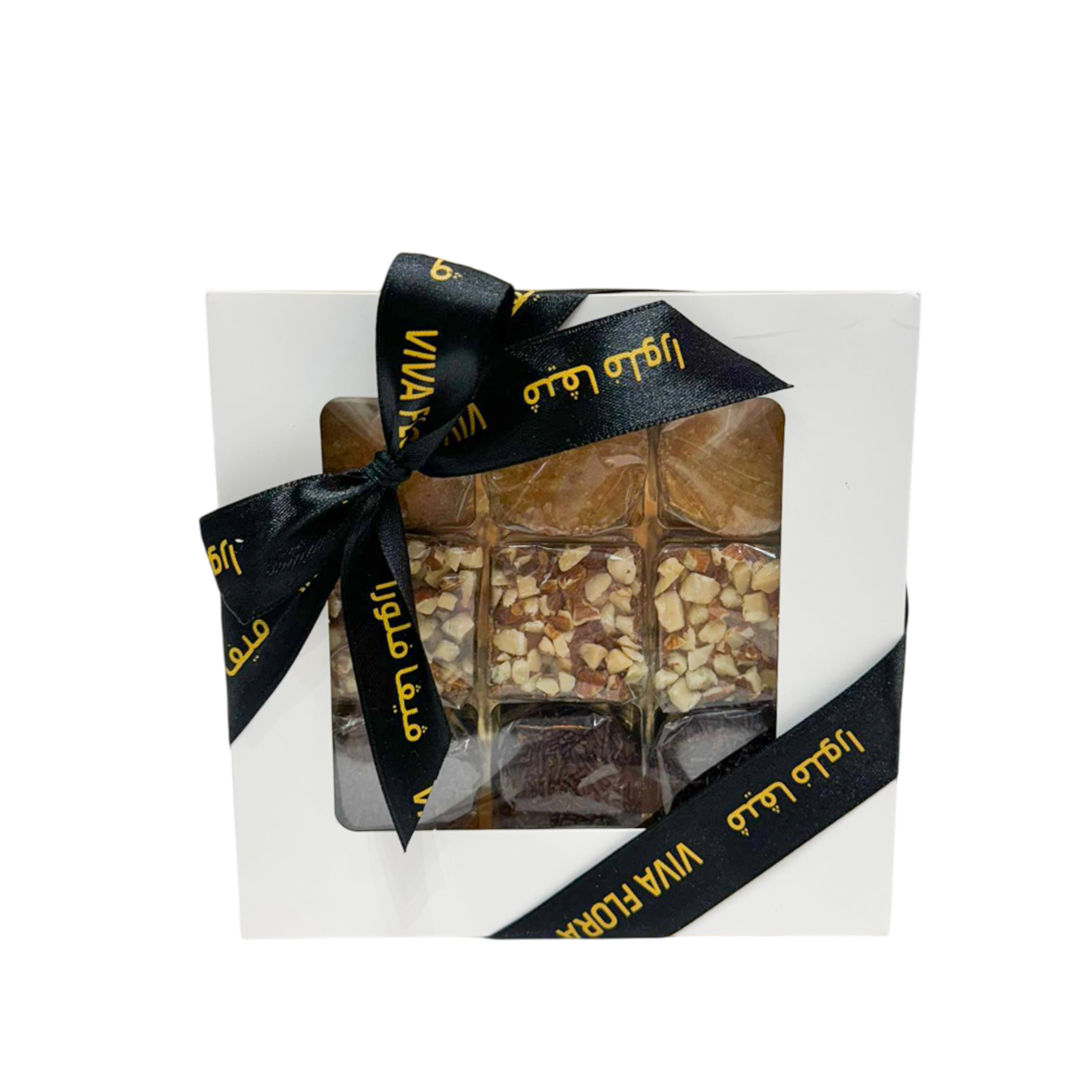 White gift box with a clear window displaying assorted nut-topped chocolates, finished with a black Viva Flora ribbon.