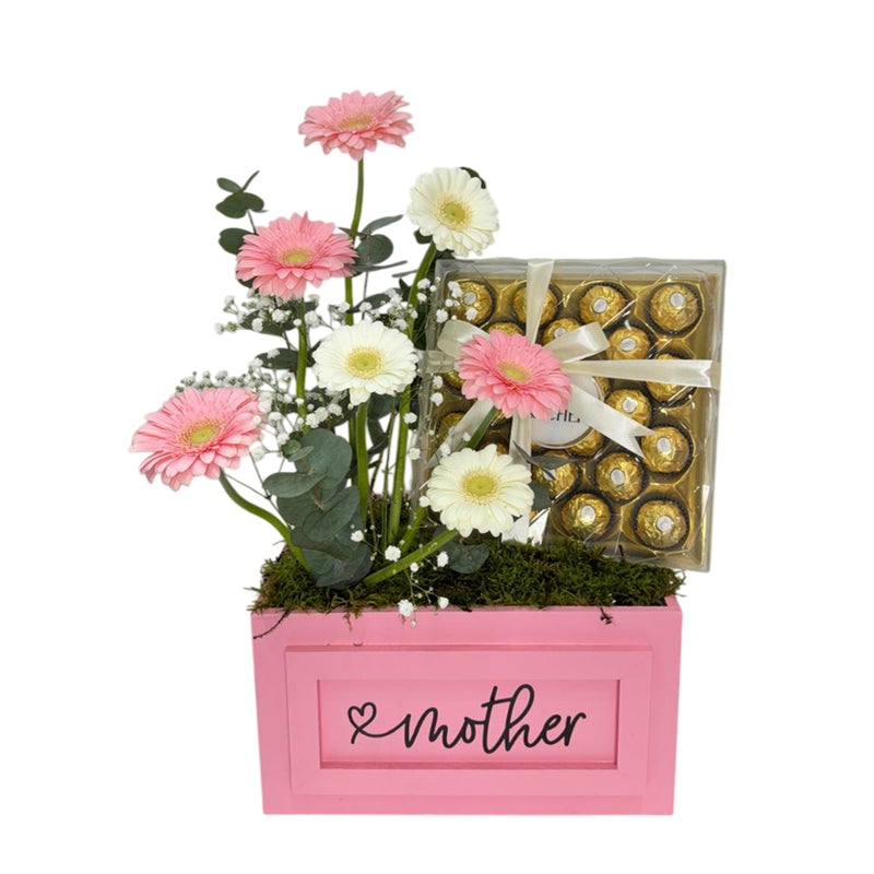 Mother’s Day gerbera flower arrangement with Ferrero Rocher chocolates in a pink box