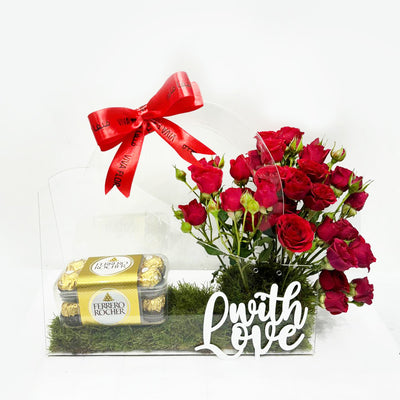 Romantic gift box with red roses, chocolates, and a 'with Love' sign