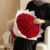 bouquet with 100 fresh red flowers delivery all over qatar