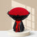 A large bouquet of red roses wrapped in black paper with a red ribbon bow, photographed on a clean white background.