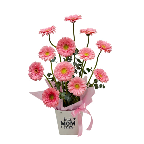 Pink gerbera daisies in a "Best Mom Ever" white box with a pink ribbon