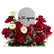 Flower arrangement with red roses, white gerberas, with  "I Love You" sign in middle.