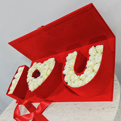 Red box shaped like the word 'I love you' order now and make the day more memorable with your loved once 