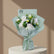 A bouquet of Peony with green eucalyptus stems, wrapped in pale mint green tissue paper and tied with a matching ribbon. A card at the top reads VIVA FLORA