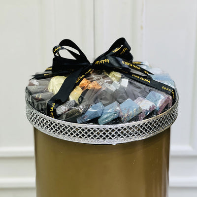 Premium Assorted chocolates with a black ribbon and Silver Tray available for same day delivery from viva flora