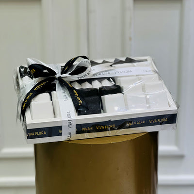 assorted chocolate wrapped with white and black colour, viva flora premium chocolates order online in qatar.
