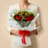 a lady holding a red roses bouquet in beige colour background