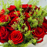 fresh red roses 40 stems with greenery mixed flower hand bouquet closup for flower detailing 
