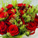fresh red roses 40 stems with greenery mixed flower hand bouquet closup for flower detailing 