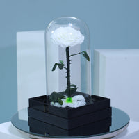 reserved white single rose with elegant wrapping for luxury flower gifts in Qatar