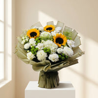 Mixed sun flower bouquet order online in qatar, send flowers to your loved once in qatar.